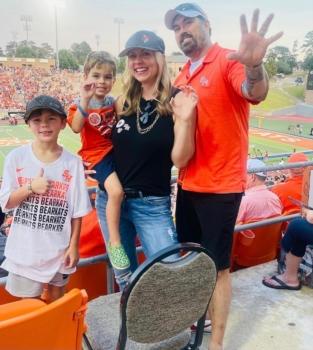 Morgan and Leslie Luttrell and their sons Lincoln (C) and Gunner at a Sam Houston State University Bearkat football game in 2021. (Courtesy of the Luttrell family).