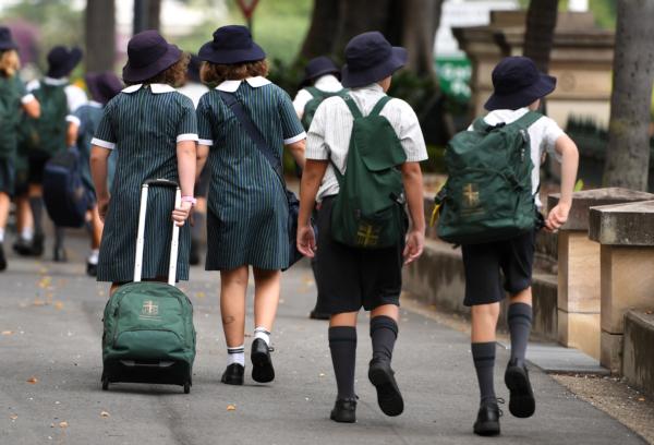 School students are seen in Brisbane, Australia, on May 2, 2018. (AAP Image/Dan Peled)