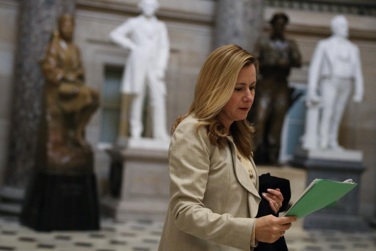 U.S. Rep. Debbie Mucarsel-Powell (D-Fla.) reads a document as she passes through the National Statuary Hall at the U.S. Capitol in Washington on Jan. 9, 2020. (Alex Wong/Getty Images)