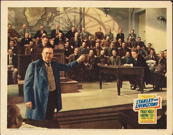 Lord Tyce (Charles Coburn, L) and Henry M. Stanley (Spencer Tracy, at the desk), in "Stanley and Livingstone." (20th Century Fox)