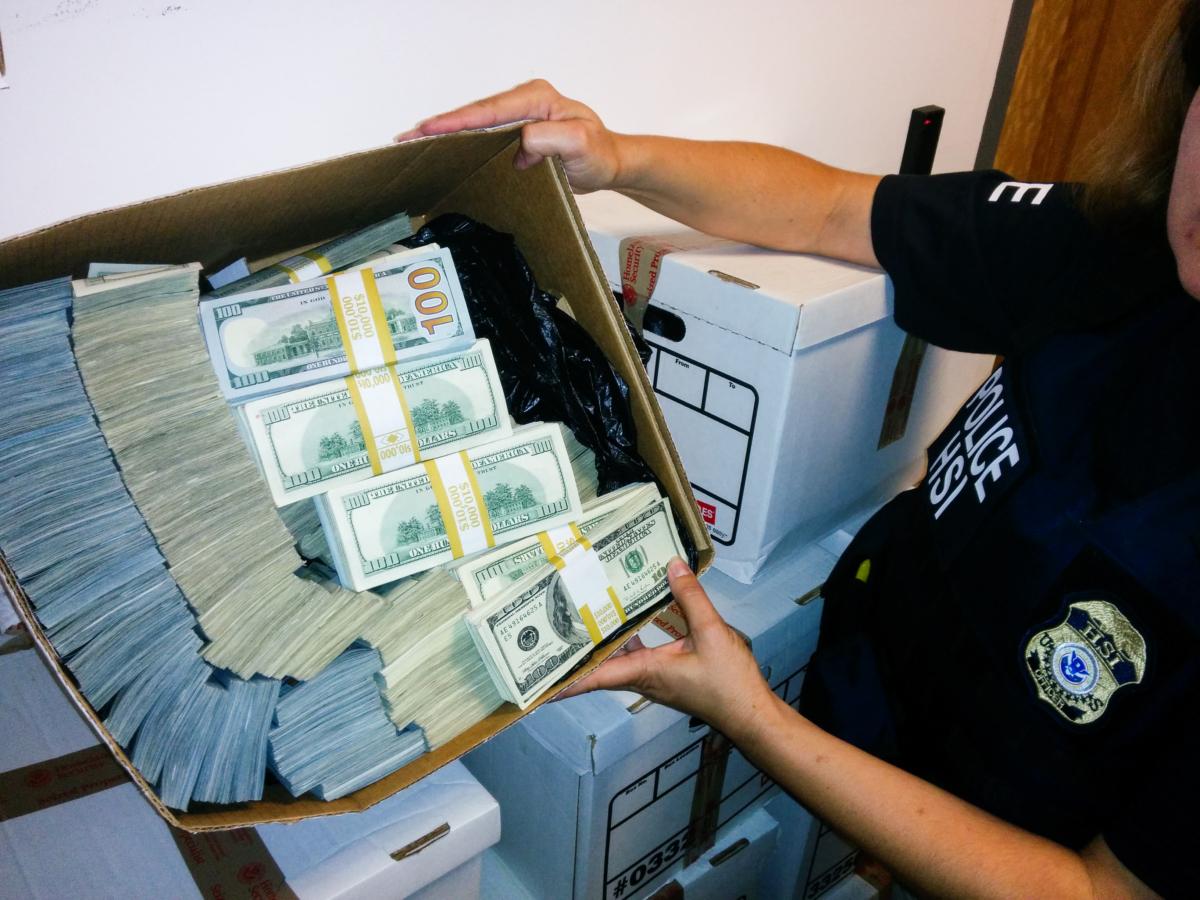 Cash seized by law enforcement during a raid in Los Angeles on Sept. 10, 2014. (DOJ)