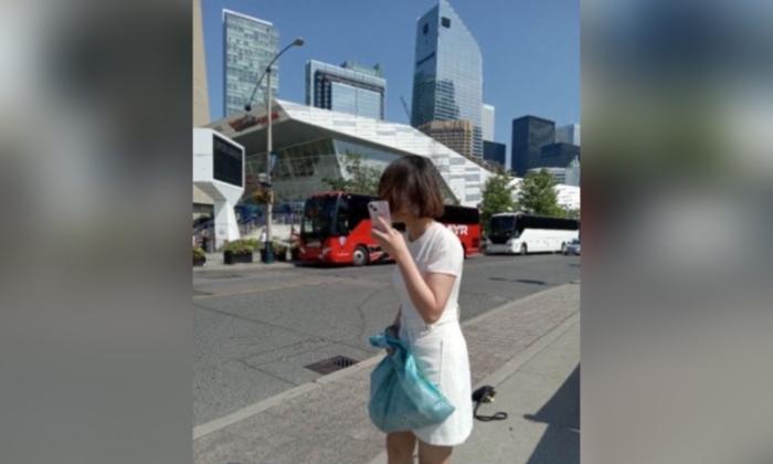 Woman Arrested After Allegedly Threatening, Harassing Falun Gong Adherent in Toronto