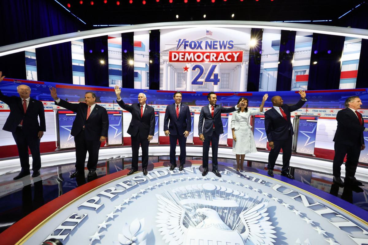 Republican presidential candidates (L--R) former Arkansas Gov. Asa Hutchinson, former New Jersey Gov. Chris Christie, former Vice President Mike Pence, Florida Gov. Ron DeSantis, entrepreneur Vivek Ramaswamy, former U.N. Ambassador Nikki Haley, U.S. Sen. Tim Scott (R-S.C.), and North Dakota Gov. Doug Burgum, are introduced during the first debate of the GOP primary season hosted by FoX News at the Fiserv Forum in Milwaukee on Aug. 23, 2023. (Scott Olson/Getty Images)