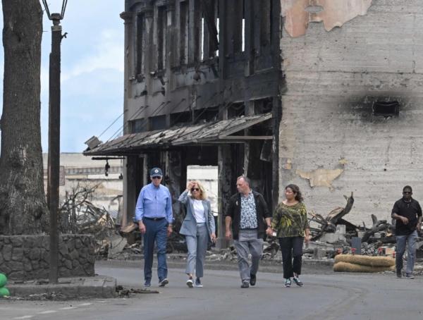 (L-R) U.S. President Joe Biden, First Lady Jill Biden, Hawaii Governor Josh Green, and wife Jaime Green walk along Front Street to inspect wildfire damage in Lahaina, Hawaii, on August 21, 2023. (Mandel Ngan/AFP via Getty Images)