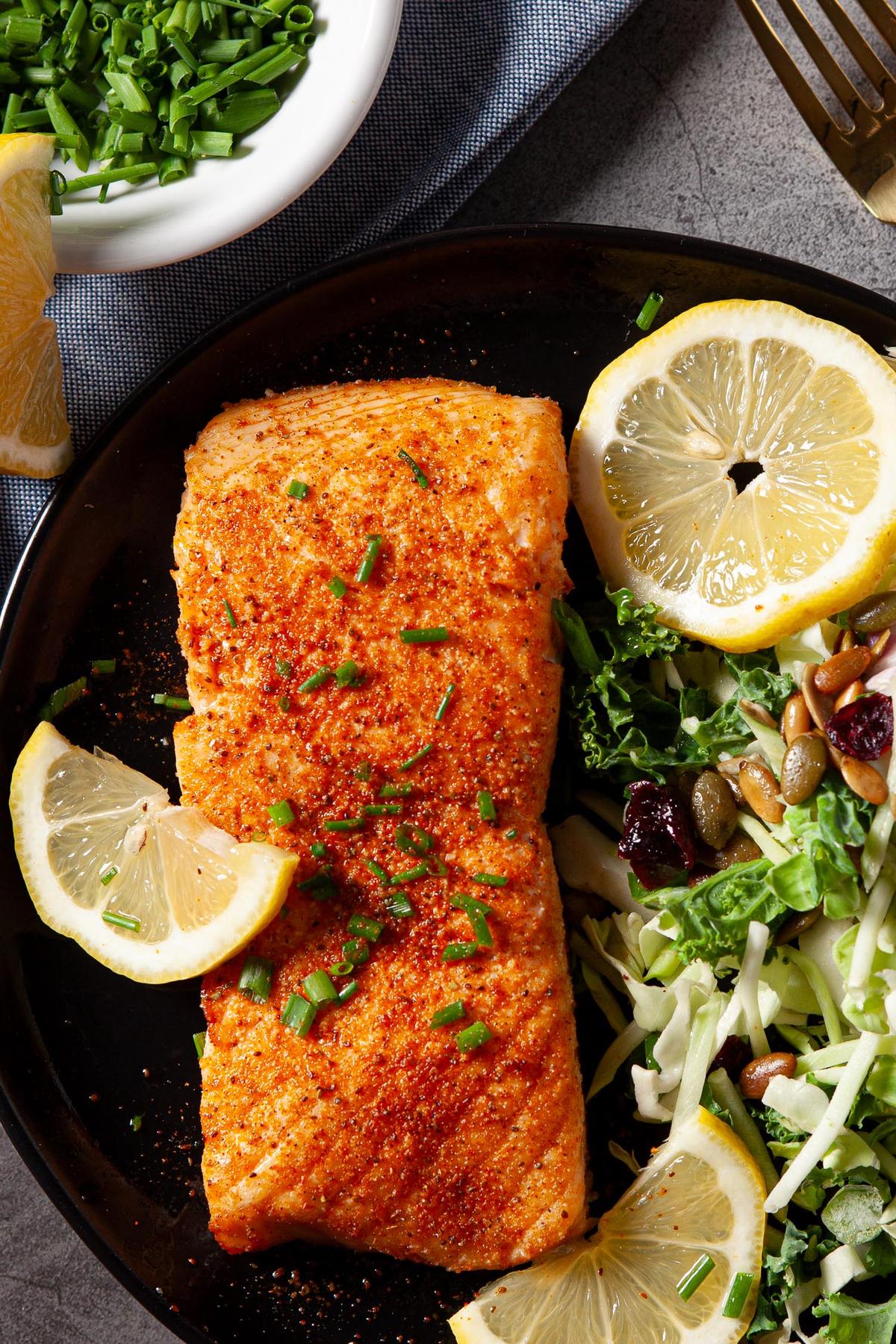 Serve air fryer salmon with a crispy green salad, for a healthy yet delicious meal. (Courtesy of Amy Dong)