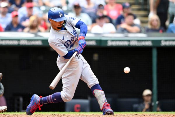 Los Angeles Dodgers' Mookie Betts hits a two-run double during the eighth inning in the continuation of a suspended baseball game against the Cleveland Guardians in Cleveland on Aug. 24, 2023. (Nick Cammett/AP Photo)