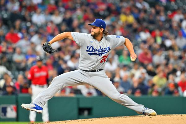 Starting pitcher Clayton Kershaw (22) of the Los Angeles Dodgers pitches during the first inning against the Cleveland Guardians at Progressive Field in Cleveland on August 23, 2023. (Jason Miller/Getty Images)