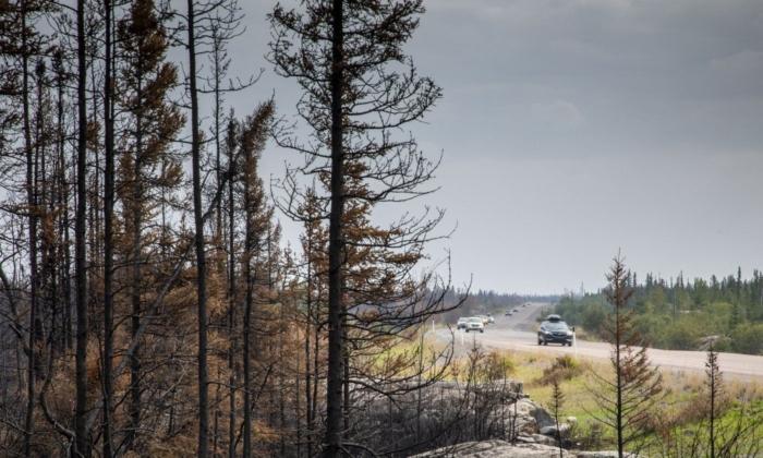 NWT Wildfires Disrupt Phone, Internet Services as Evacuee Anxiety Mounts