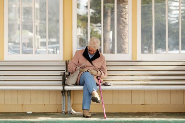 An elderly woman rests on a bench in Sydney, Australia, on June 2, 2016. (Brendon Thorne/Getty Images)