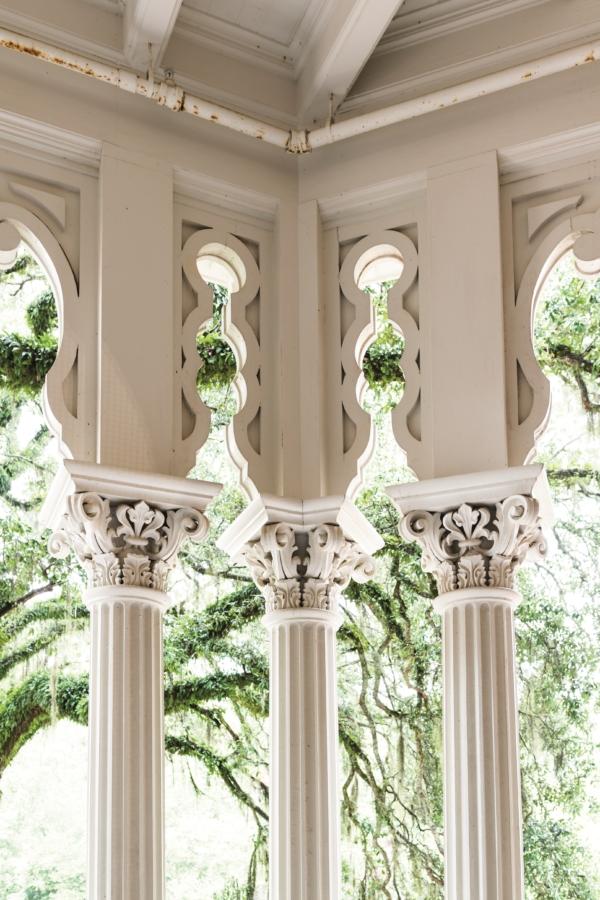 On one of the mansion’s four symmetrical two-story verandas, each facing different directions, are tri-column corners featuring classic Corinthian scroll and leaf design. These fluted columns on pedestals represent only three of the numerous columns on the home’s exterior, and they provide not only support but ornamentation. (Courtesy of Pilgrimage Garden Club)