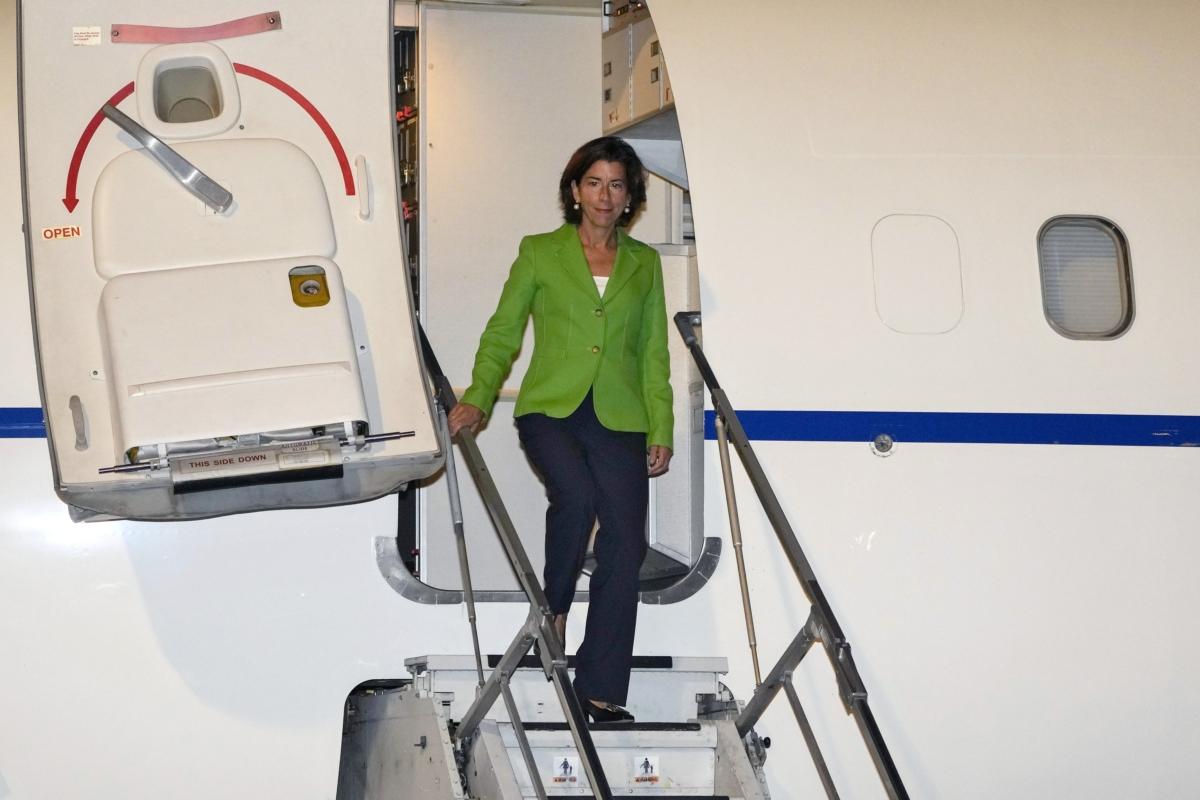 U.S. Commerce Secretary Gina Raimondo steps from a plane as she arrives at the Beijing Capital International Airport in Beijing on Aug. 27, 2023. (Andy Wong/Pool via Getty Images)