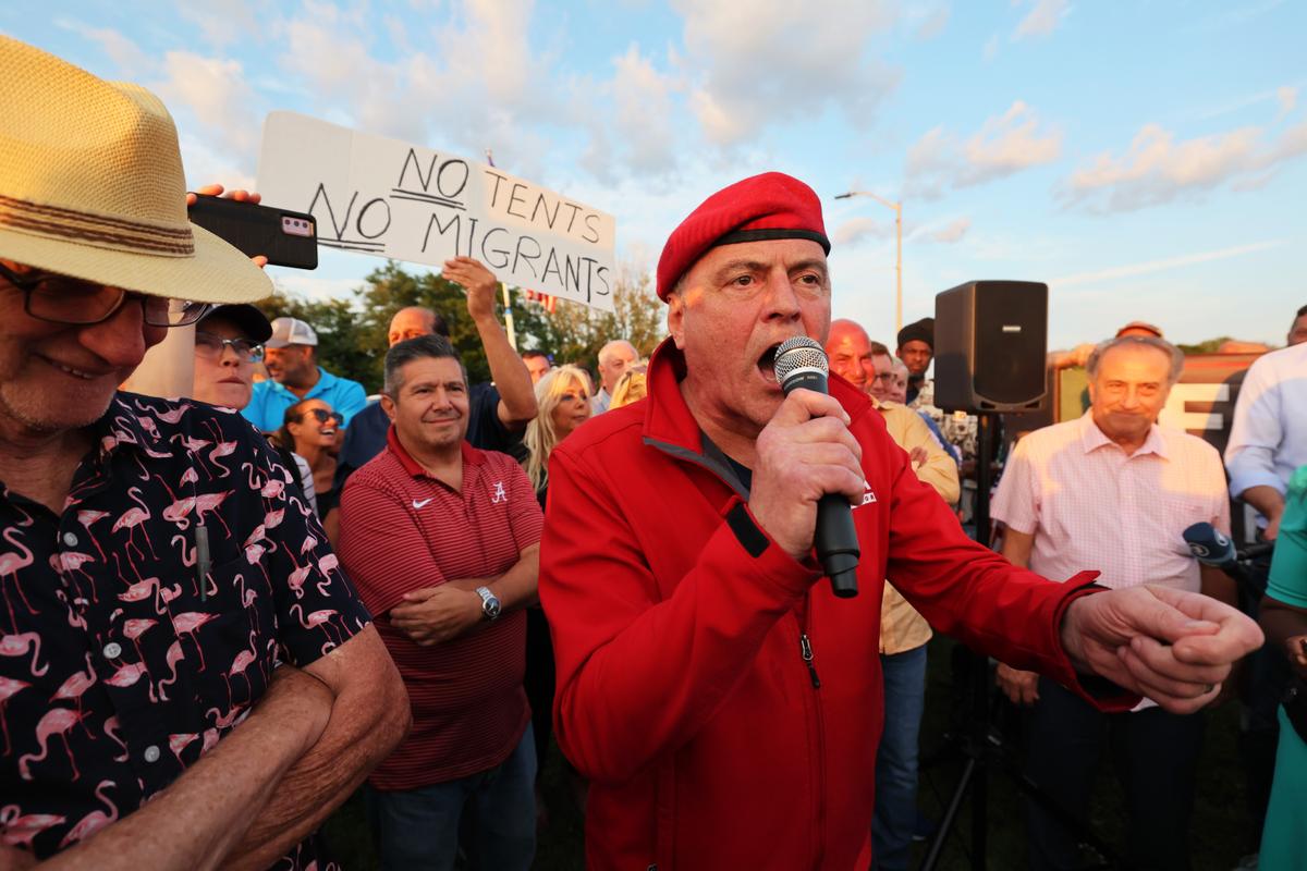 Guardian Angels founder Curtis Sliwa speaks at an anti-illegal immigrant protest at Floyd Bennett Field in the Marine Park neighborhood of the Brooklyn borough of New York City on Aug. 22, 2023. (Michael M. Santiago/Getty Images)