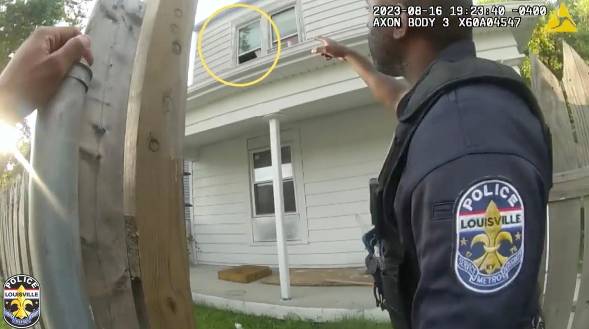 A screenshot from body camera footage shows LMPD officers Roach and Isaacs responding to reports of a woman screaming for help inside a home on 1700 block of Bolling Avenue, in Louisville, Kentucky. (Courtesy of Louisville Metro Police Department)
