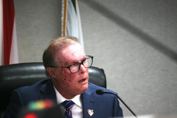 Commissioner Chris Hall speaks at the Collier County Board of County Commissioners meeting in Naples, Fla., on Aug. 22, 2023. (Patricia Tolson/The Epoch Times)