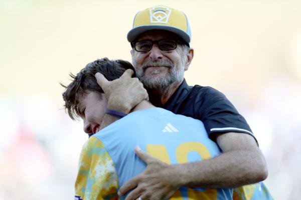 Danny Boehle, manager, and Louis Lappe (19) of the West Region team from El Segundo, California celebrate after winning the Little League World Series Championship Game against the Caribbean Region team from Willemstad, Curacao at Little League International Complex in South Williamsport, Pa., on Aug. 27, 2023. (Tim Nwachukwu/Getty Images)