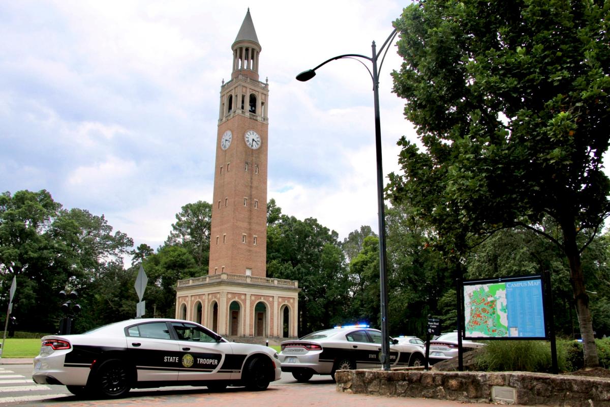 Law enforcement respond to the University of North Carolina at Chapel Hill campus in Chapel Hill, N.C., on Aug. 28, 2023, after the university locked down and warned of an armed person on campus. (Hannah Schoenbaum/AP Photo)