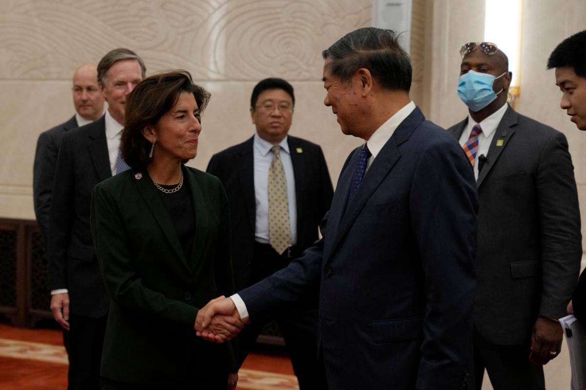 Chinese Vice Premier He Lifeng greets U.S. Commerce Secretary Gina Raimondo at the Great Hall of the People in Beijing on Aug. 29, 2023. (Andy Wong/Pool/AFP via Getty Images)