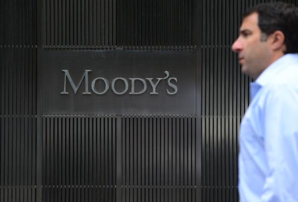 A sign for Moody's rating agency is displayed at the company headquarters in New York, on Sept. 18, 2012. (Emmanuel Dunand/AFP via Getty Images)