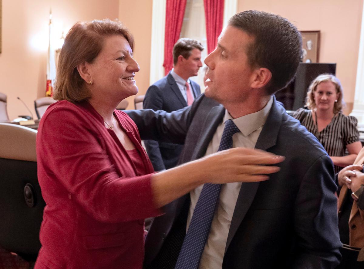 State Senate President Toni Atkins hugs Sen. Mike McGuire (D-Healdsburg) after he was named her successor at the Capitol in Sacramento on Aug. 28, 2023. (Rich Pedroncelli/AP Photo)