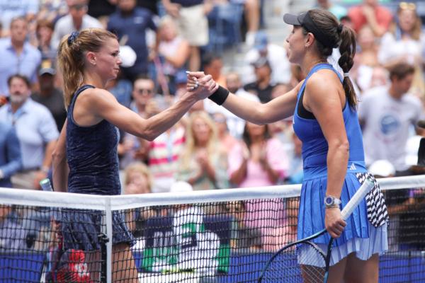 USA's Jessica Pegula and Italy's Camila Giorgi shake hands after their US Open tennis tournament women's singles first round match at the USTA Billie Jean King National Tennis Center in New York City, on August 29, 2023. (Kena Betancur/AFP via Getty Images)