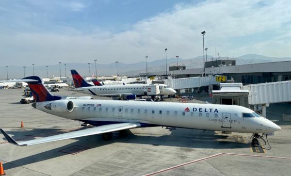 A Delta Airlines plane is seen at the gate at Salt Lake City International Airport (SLC) on Oct. 5, 2020. (Daniel Slim/AFP via Getty Images)