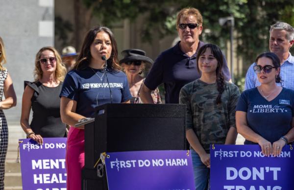 Sophie Lorey, who played soccer at Vanguard University in Costa Mesa, Calif., speaks at the California state Capitol in Sacramento on Aug. 28, 2023, against boys identifying as transgender playing in girls’ sports and using their locker rooms. (John Fredricks/The Epoch Times)