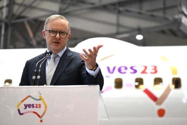 Prime Minister Anthony Albanese speaking as QANTAS unveil their Yes23 livery being carried on some of their aircraft at Sydney Domestic Airport in Sydney, Australia, on Aug. 14, 2023. (AAP Image/Dean Lewins)