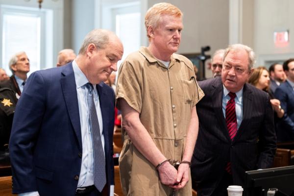 Alex Murdaugh speaks with his legal team before he is sentenced to two consecutive life sentences for the murder of his wife and son by Judge Clifton Newman at the Colleton County Courthouse in Walterboro, S.C., on March 3, 2023. (Joshua Boucher/The State via AP)
