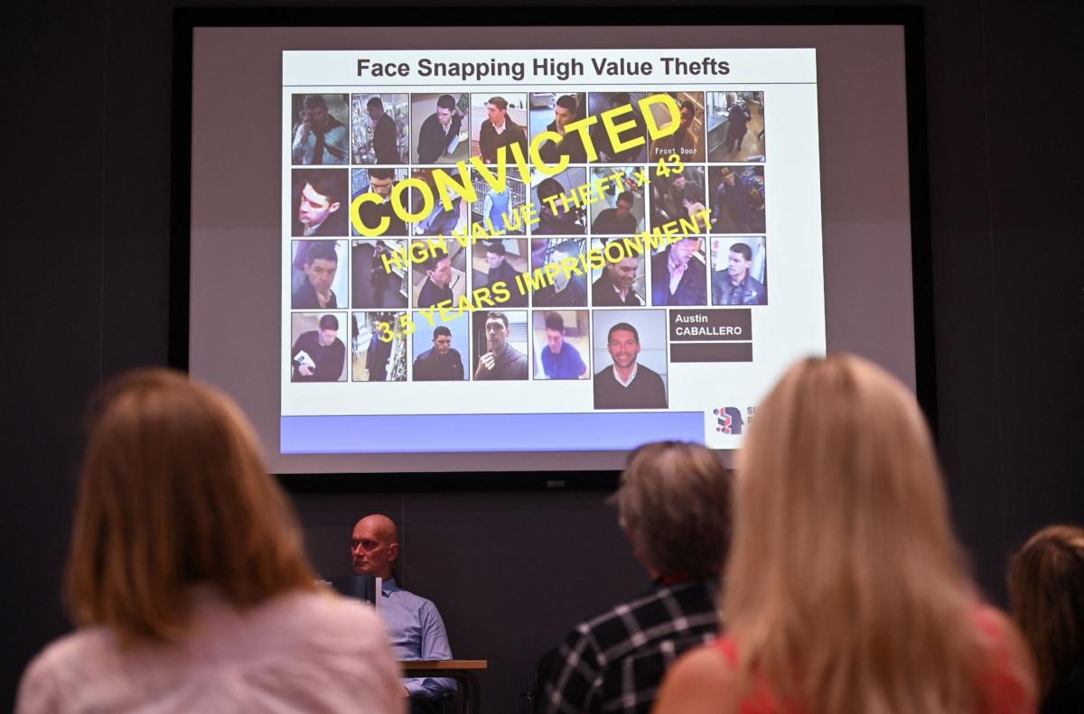 An example of CCTV images of a criminal is displayed on a slide during a media event at a Thames Valley Police training facility in Sulhamstead near Reading, England, on Aug. 24, 2023. (Justin Tallis/AFP via Getty Images)