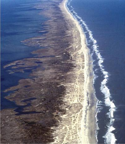 Aerial view of Outer Banks (looking north), with the sound on the left and the ocean on the right. (Public Domain)