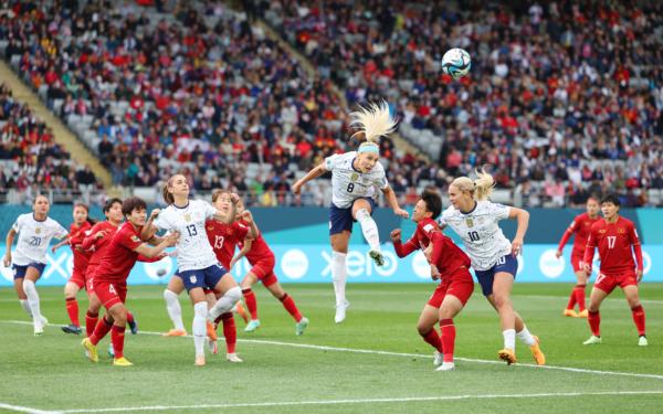 Julie Ertz of USA and Tran Thi Hai Linh of Vietnam compete for the ball during the FIFA Women's World Cup Australia & New Zealand 2023 Group E match between USA and Vietnam at Eden Park in Auckland, New Zealand, on July 22, 2023. (Phil Walter/Getty Images)