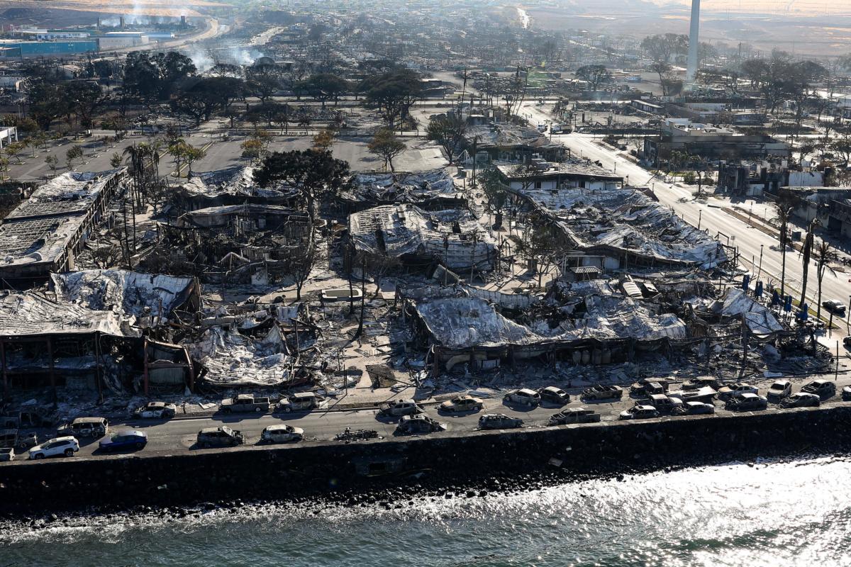 Cars destroyed by wildfire line remain Front Street in Lahaina, Hawaii, on Aug. 11, 2023. (Justin Sullivan/Getty Images)