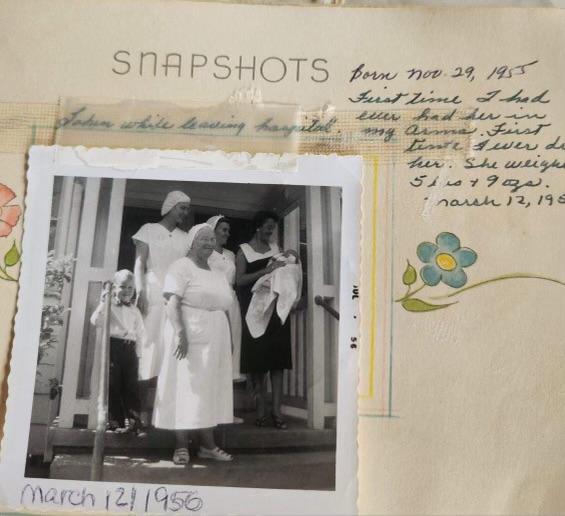 A picture in Miriam "Penny" Hopper's baby book shows the first time her mother held her outside Morell Hospital in Lakeland, Fla., on March 12, 1956. (Abortion Survivors Network)