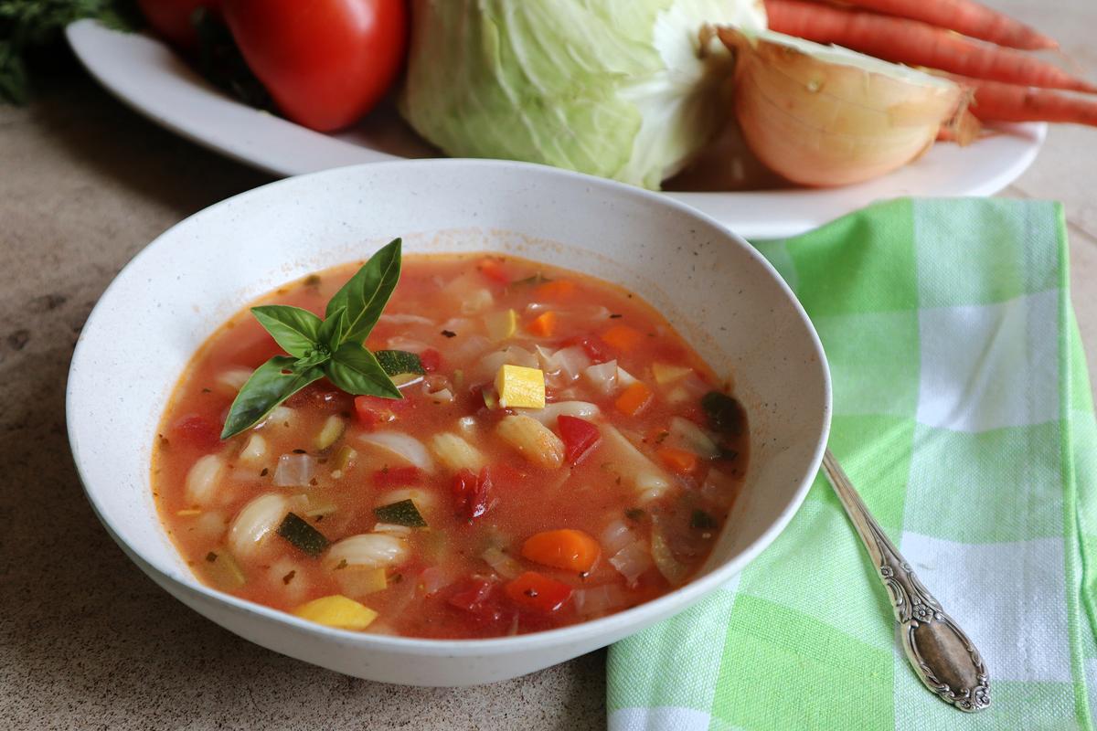 This easy and filling minestrone soup features fresh, seasonal vegetables you can find at any farmers market. (Gretchen McKay/Pittsburgh Post-Gazette/TNS)