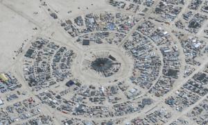 One Death Reported as Thousands of Burning Man Attendees Stranded in Rain, Mud in Desert