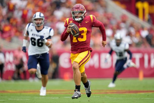 Southern California quarterback Caleb Williams (13) runs the ball during the first half of an NCAA college football game against Nevada in Los Angeles, Sept. 2, 2023. (Ashley Landis/AP Photo)