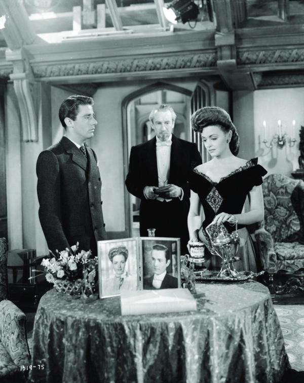 (L–R) David Stone (Peter Lawford), Lord Henry Wotton (George Sanders), and Gladys Hallward (Donna Reed), in “The Picture of Dorian Gray.” (Metro-Goldwyn-Mayer)