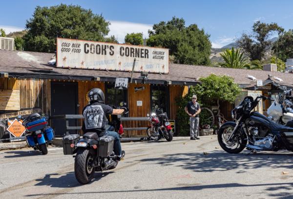 People partake in the reopening of Cook's Corner restaurant and bar, after the a recent mass shooting left three dead and several wounded, in Trabuco Canyon, Calif., on Sept. 1, 2023. (John Fredricks/The Epoch Times)