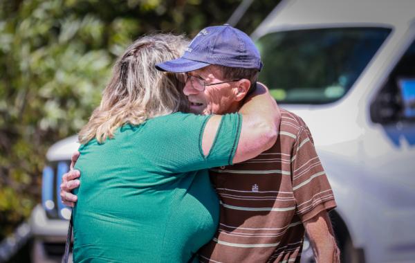 People mourn the loss of victims after a recent mass shooting left three dead and several wounded at Cook's Corner restaurant and bar in Trabuco Canyon, Calif., on Sept. 1, 2023. (John Fredricks/The Epoch Times)