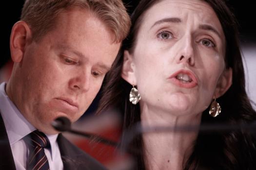 Former Prime Minister Jacinda Ardern and then COVID-19 Response Minister Chris Hipkins address the media at a COVID-19 update press conference at Parliament in Wellington, New Zealand, on Oct. 11, 2021. (Robert Kitchin - Pool/Getty Images)