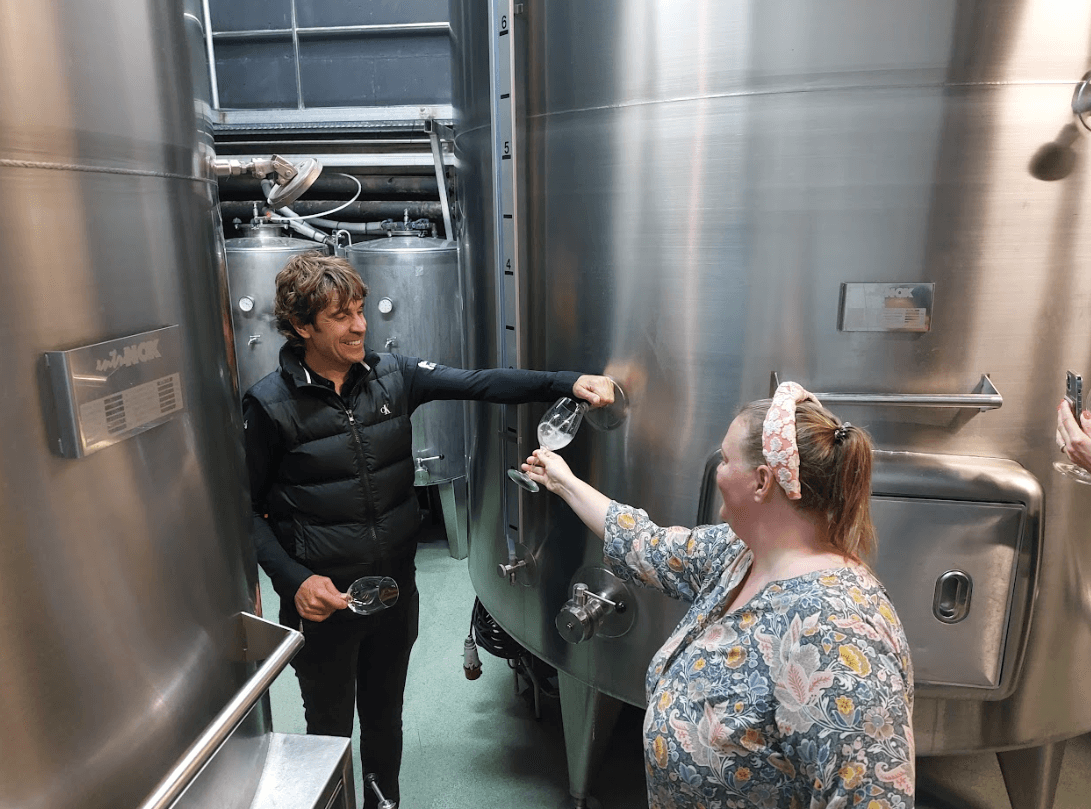 A pour from an owner: Iñaki Zendoia (L) opened winery/restaurant Bodega Katxiña with his sister Izaskun in 2014 to commercially produce their father's wine, which had been a best kept secret at the family's restaurant for many years. (Kevin Revolinski)