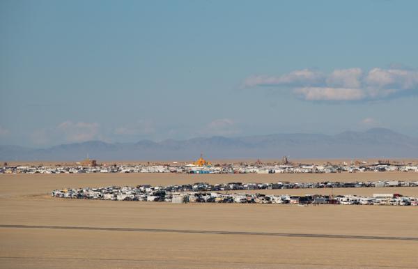 A line of vehicles waits in a 7.5-hour line to exit the Burning Man festival in Black Rock, Nev., on Sep. 4, 2023. (John Fredricks/The Epoch Times)