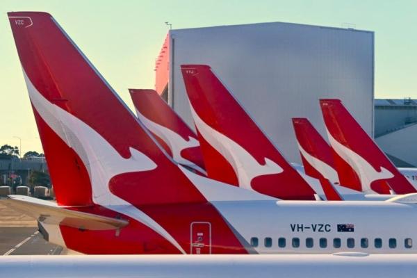 A photo taken on Aug. 20, 2023, shows a line-up of Qantas planes at Sydney's Kingsford Smith Airport. (William West/AFP via Getty Images)