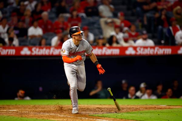 Ryan Mountcastle (6) of the Baltimore Orioles hits a rbi single against the Los Angeles Angels in the ninth inning at Angel Stadium of Anaheim in Anaheim, Calif., on Sept. 5, 2023. (Ronald Martinez/Getty Images)