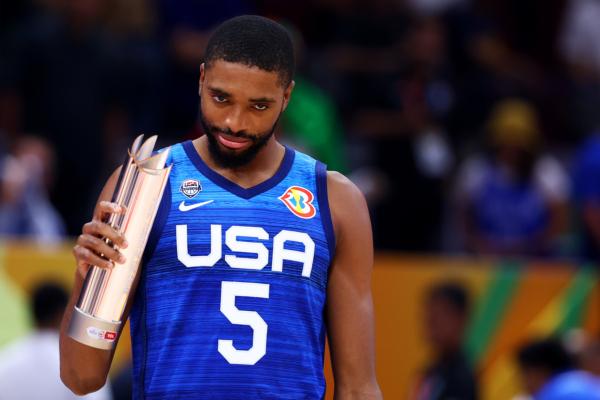 Mikal Bridges #5 of the United States reacts after being awarded the Player of the Game trophy following the FIBA Basketball World Cup quarterfinal victory over Italy at Mall of Asia Arena in Manila, Philippines, on Sept. 5, 2023. (Yong Teck Lim/Getty Images)