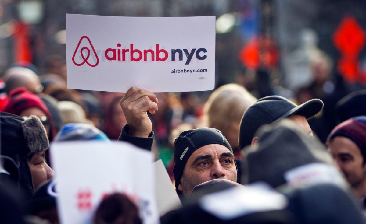 Supporters of Airbnb hold a rally outside City Hall in New York in a file photo. (Bebeto Matthews/AP Photo)