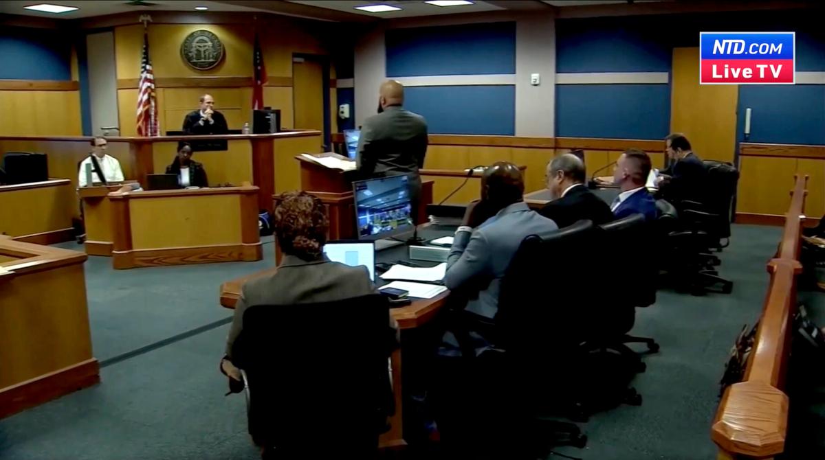 Fulton County Superior Court Judge Scott McAfee presides over a severance hearing for co-defendants Kenneth Chesebro and Sidney Powell, who are requesting their cases be severed from each other, as well as the others charged in this case, in Atlanta on Sept. 6, 2023, in a still from a video. (Atlanta Pool via Reuters/Screenshot via NTD)