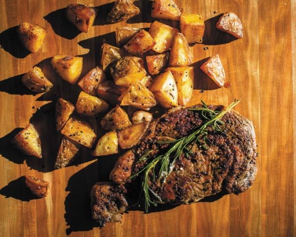 Seared Rib Eyes With Blue Cheese Butter and Beef-Fat Potatoes