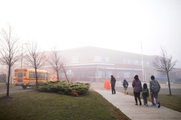 A file photo of children arriving at a school in Milton, Ont., on Nov. 4, 2022. (Nick Iwanyshyn/The Canadian Press)