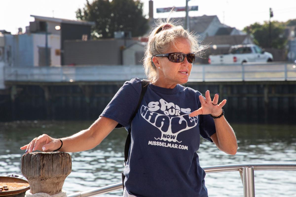 Conservation biologist and founder of the SaveOurWhalesNow organization, Trisha DeVoe, on Sept 6., 2023, in Belmar, New Jersey. (Richard Moore/The Epoch Times)